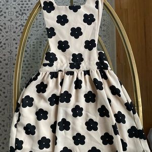 Cream and Black Floral Mini Dress with Cut out sides, sinch waist and skirt